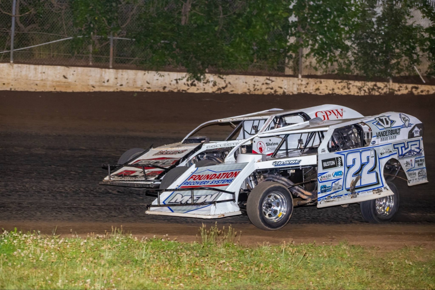 Dustin Hodges (22) on his way to victory lane in CMS Heartland Modified Tour action. Photo by Josh Allee.